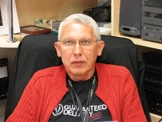 Satellite broadcast engineer operating OB VAN uplink system Chernov Serhii