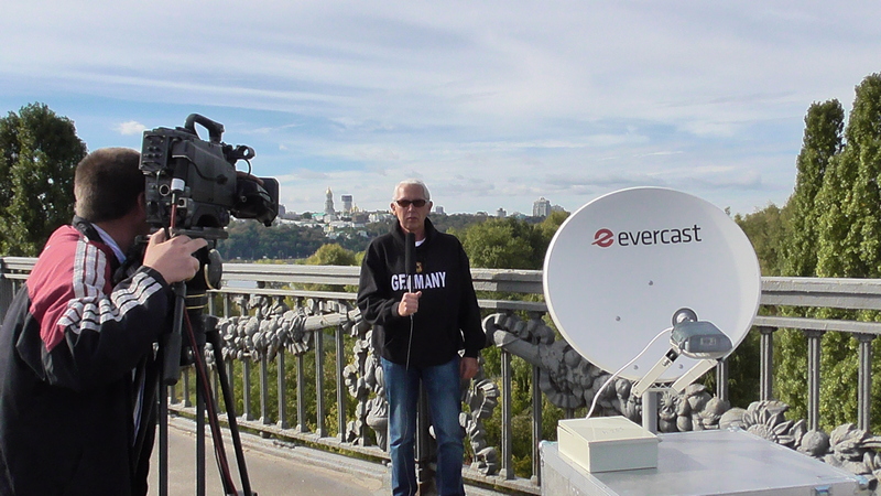 Satellite broadcast engineer operating OB VAN uplink system Chernov Serhii